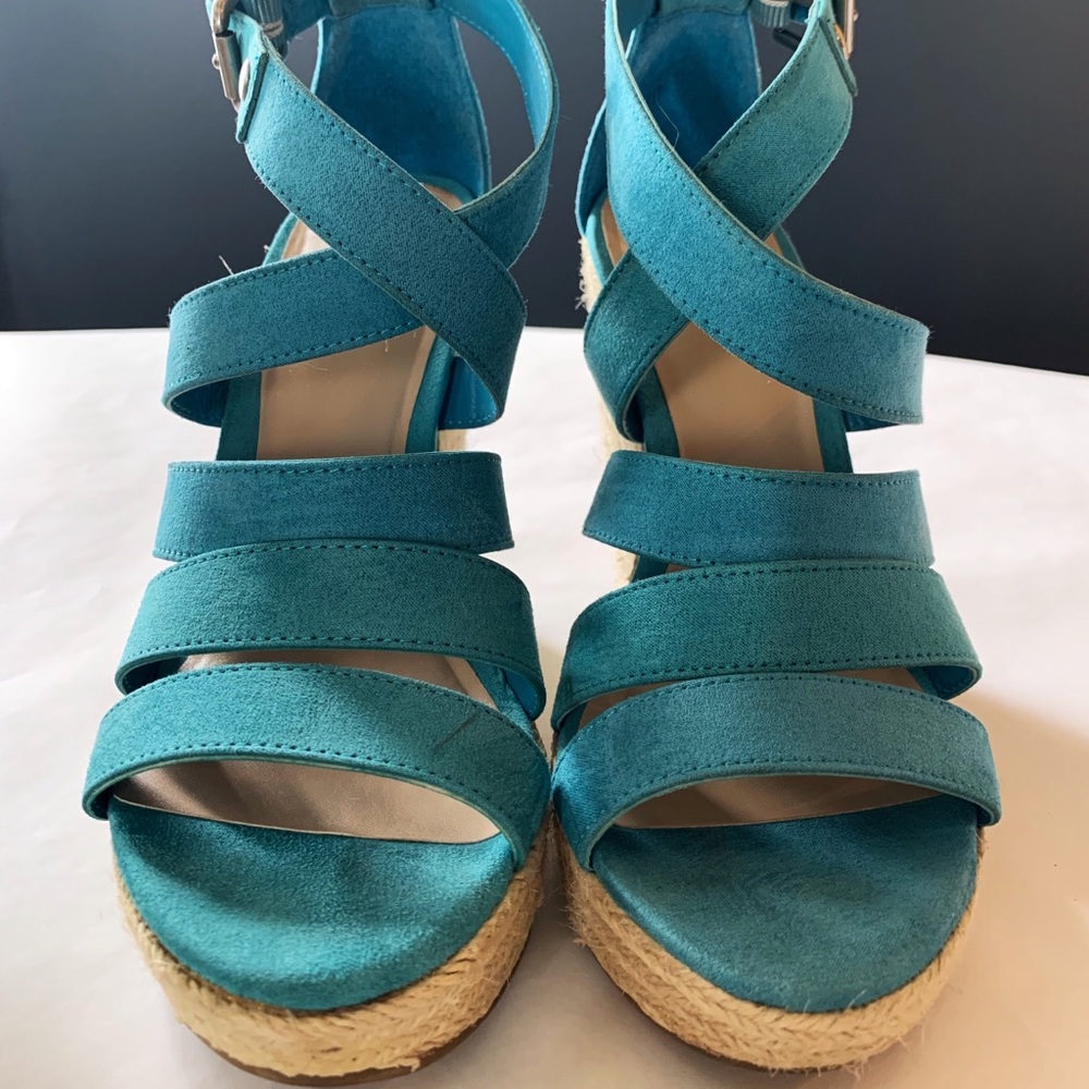 Turquoise strappy wedge.